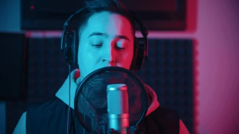 Stock Video A Man Singing To A Professional Microphone Live Wallpaper For PC - For Wallpaper