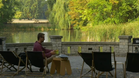 Stock Video A Man Leaves The Terrace By The Lake Live Wallpaper For PC - For Wallpaper