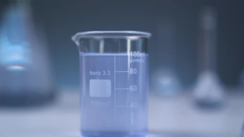 Stock Video Blue Flask Surrounded By Other Unfocused Flasks Live Wallpaper For PC - Wallpaper video anime Wallpaper