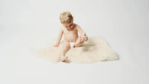 Stock Video Blonde Baby Sitting On A Rug Live Wallpaper For PC - On Wallpaper
