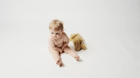 Stock Video Blonde Baby Girl Sitting In A White Background Live Wallpaper For PC - Live Wallpaper