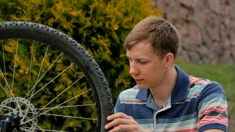 Stock Video Bike Repair Man Spins Wheel And Gives Ok Live Wallpaper For PC - Live Wallpaper