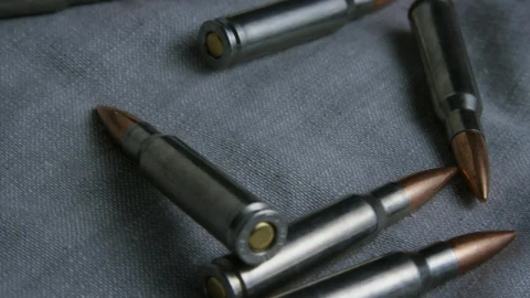 Stock Video Big Bullets Over A Fabric Live Wallpaper For PC - Live Wallpaper