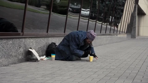 Stock Video Beggar Picking Change From The Street Live Wallpaper For PC - Live Wallpaper