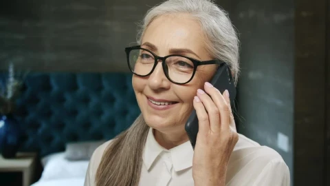 Stock Video Beautiful Elderly Woman Chats On Mobile Phone Live Wallpaper For PC - Live Wallpaper