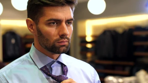 Stock Video Bearded Man Tying A Tie To His Suit Live Wallpaper For PC - Live Wallpaper