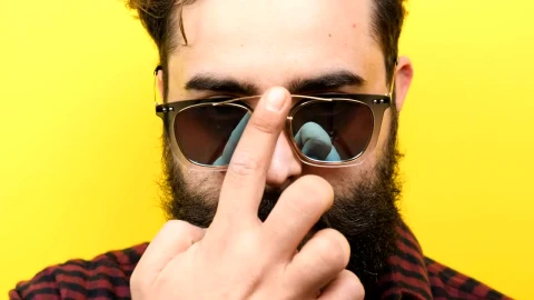 Stock Video Bearded Hipster Man Smiling With Yellow Background Live Wallpaper For PC - Live Wallpaper