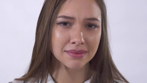 Video Stock Closeup Of Young Woman Crying On White Background Live Wallpaper For PC - Live Wallpaper
