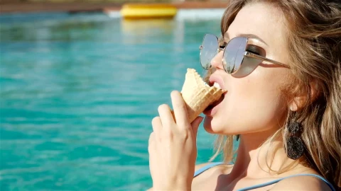 Video Stock Closeup Of Woman Eating Ice Cream In Swimsuit Live Wallpaper For PC - Live Wallpaper