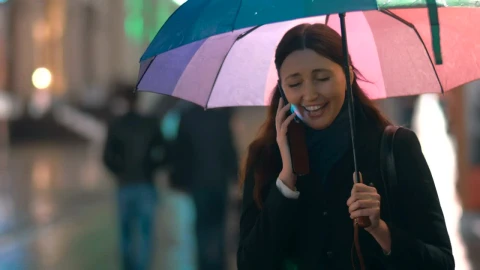 Video Stock Chatting On The Phone Under An Umbrella Live Wallpaper For PC - On Wallpaper