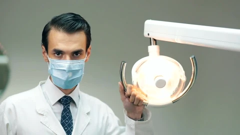 Stock Video Dentist Holding A Lamp In His Office Live Wallpaper For PC - Wallpaper Wallpaper