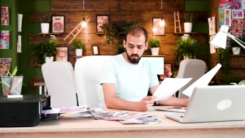 Stock Video Creative Man Prints Out Ideas In Home Office Live Wallpaper For PC - Stock Video Ice Cubes Thawing On Black Background Animated Wallpaper Wallpaper