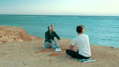 Stock Video Couple Listening To Music On A Cliff Live Wallpaper For PC - On Wallpaper
