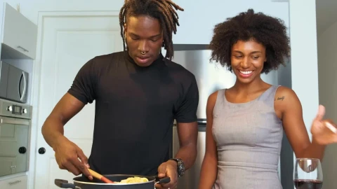 Stock Video Couple Having Fun While Cooking Live Wallpaper For PC - Stock Video Ice Cubes Thawing On Black Background Animated Wallpaper Wallpaper