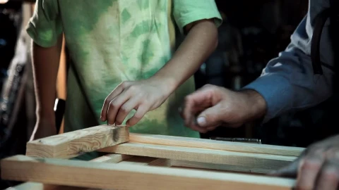 Stock Video Grandson Helping His Grandfather With Carpentry Live Wallpaper For PC animated wallpaper preview