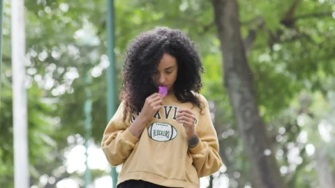 Stock Video Girl Walking In A Park Smelling A Bougainvillea Live Wallpaper For PC - Live Wallpaper