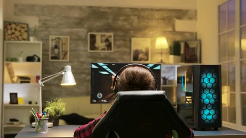 Stock Video Girl Gamer Celebrates Win In Home Office Screen View For PC