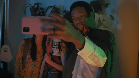 Stock Video Friends Taking A Selfie At A Costume Party Live Wallpaper For PC - Live Wallpaper