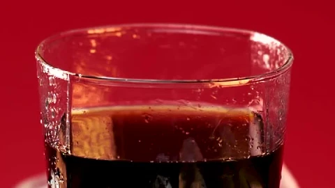 Stock Video Ice Falling Into A Glass With Soda Animated Wallpaper animated wallpaper preview