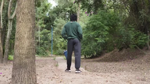 Stock Video Man In Sportswear Walking Scattered Through A Forest Animated Wallpaper - Live wallpaper gratis