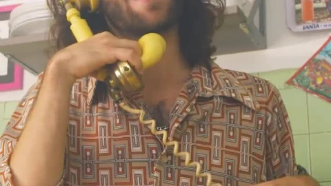 Stock Video Man Having A Phone Call At Home Animated Wallpaper - Live desktop wallpaper Wallpaper