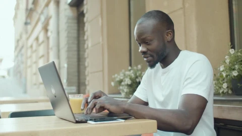 Stock Video Man Gets Emotional While Chatting Online Outside Ith Laptop Animated Wallpaper - Live desktop wallpaper Wallpaper