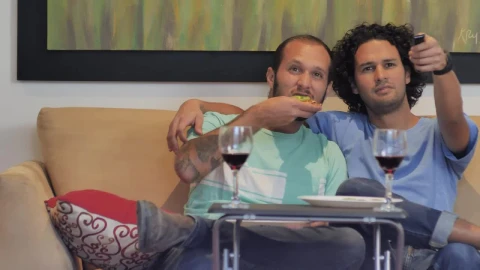 Stock Video Male Couple Watching Television Animated Wallpaper - Live desktop wallpaper Wallpaper