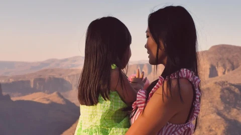 Stock Video Loving Mother Hugs Her Daughter Animated Wallpaper animated wallpaper preview