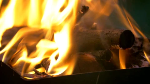 Stock Video Logs Burning In A Campfire At Night Animated Wallpaper - In Wallpaper