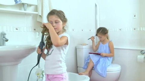 Stock Video Little Girls Doing Makeup In Bathroom Animated Wallpaper - In Wallpaper