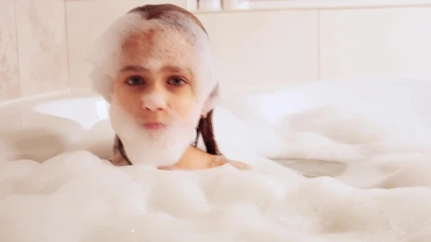 Stock Video Little Girl Playing With Foam In Her Bath Animated Wallpaper - In Wallpaper