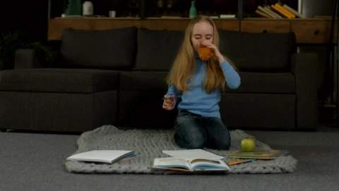 Stock Video Little Girl Doing Her Homework Animated Wallpaper animated wallpaper preview