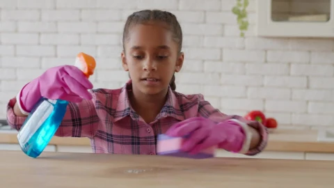 Stock Video Little Girl Cleaning In A Kitchen With Detergent Animated Wallpaper - In Wallpaper