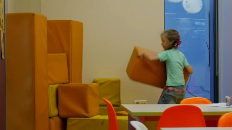 Stock Video Little Girl Building A Wall At School Animated Wallpaper animated wallpaper preview
