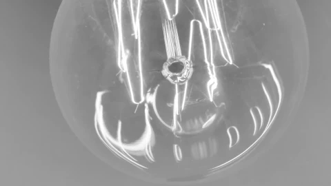 Stock Video Lit Filament Reflected In A Light Bulb Animated Wallpaper - In Wallpaper