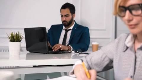 Stock Video Lawyers Working In Modern Office Look Up An Smile Animated Wallpaper - In Wallpaper