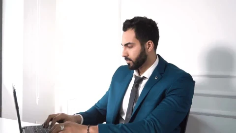 Stock Video Lawyer Types On Laptop In Minimal Office Animated Wallpaper