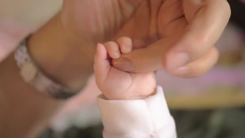 Stock Video Mother Holding Hands With Her Bab Animated Wallpaper animated wallpaper preview