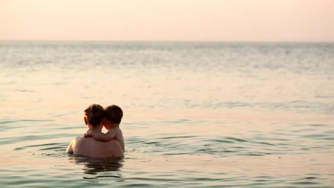 Stock Video Mother And Son In Gentle Wave Animated Wallpaper animated wallpaper preview