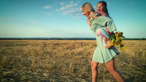 Stock Video Mother And Daughter Taking A Walk In The Fiel Animated Wallpaper - In Wallpaper