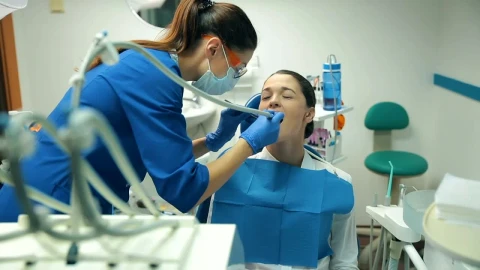 Stock Video Patient Receiving Dental Treatment Live Wallpaper – Free Live Wallpaper