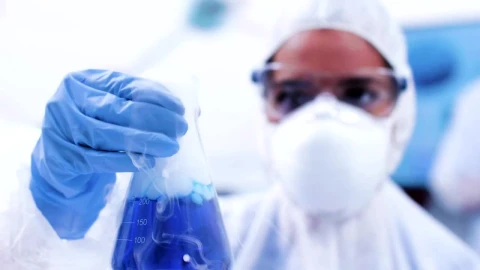 Free Stock Video Scientist Holding A Smoking Test Sample Live Wallpaper - A Wallpaper