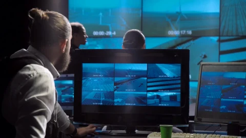 Free Video Stock surveillance team looking at monitors Live Wallpaper animated wallpaper preview