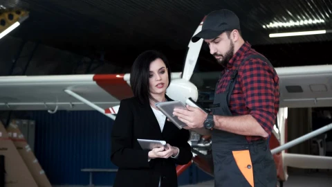 Free Video Stock this woman talking to plane technician Live Wallpaper animated wallpaper preview