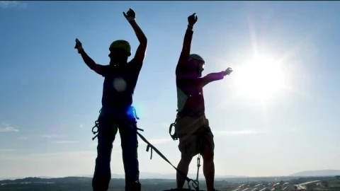Free Stock Video Two Mountaineers Celebrating At The Top Live Wallpaper - Stock Wallpaper