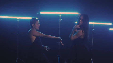Free Stock Video Two Girls Dancing With Blue Neon Lights In The Background Live Wallpaper - Stock Wallpaper