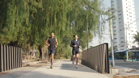 Free Stock Video Young Man And Woman Jogging Outdoors Live Wallpaper - Stock Wallpaper