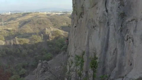 Free Stock Video Young Female Mountaineer Climbing A Large Rocky Mountain Smalllive Wallpaper - Stock Wallpaper