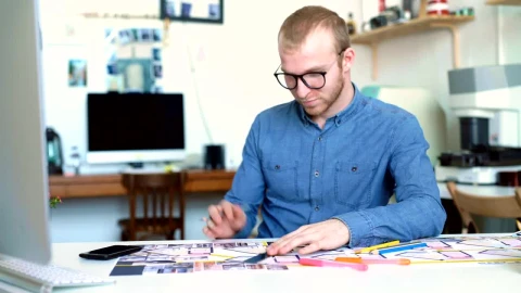 Free Stock Video Young Architect Works Concentrated On A Blueprint Live Wallpaper - Stock Wallpaper