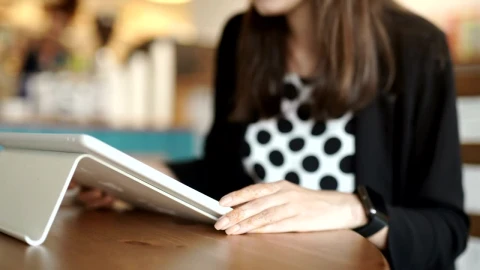 Free Stock Video Woman Syncing Her Smart Watch With Her Tablet Live Wallpaper - Stock Wallpaper